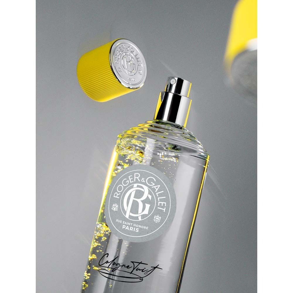 Flakon mit gelbem Deckel, Sprühkopf sichtbar. Aufschrift: ROGER&GALLET, Cologne Twist.