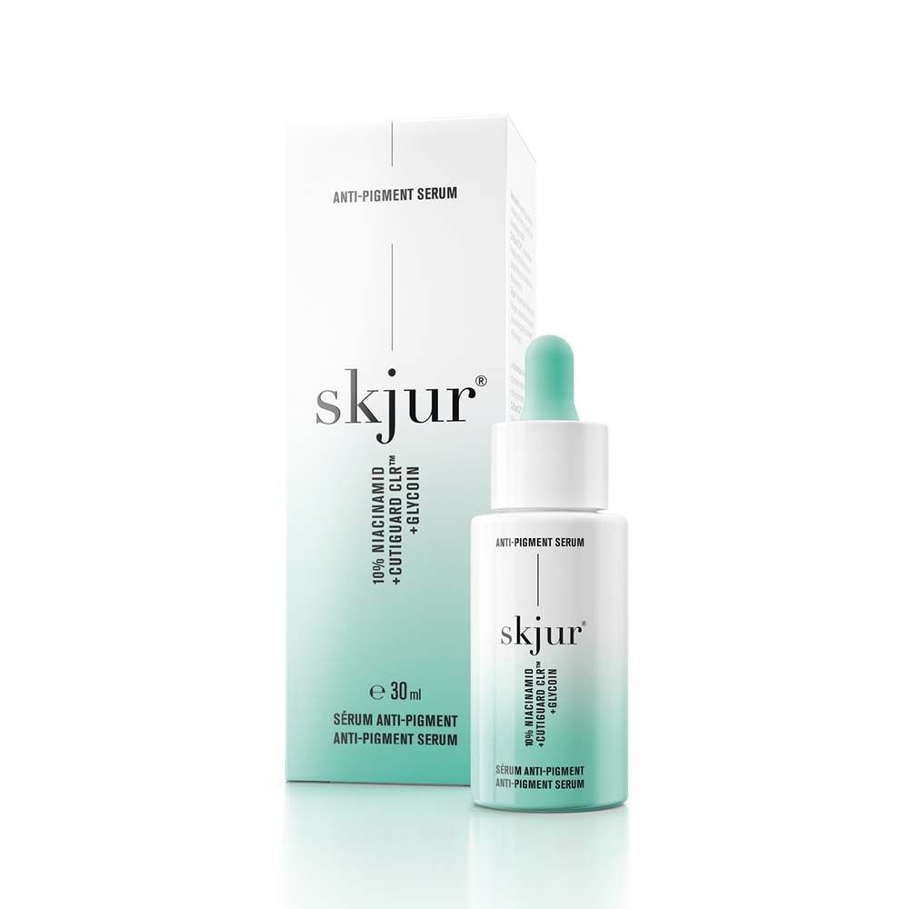 skjur® Anti-Pigment Serum. Flasche und Verpackung. Weiß, Türkis. Mit Pipette.