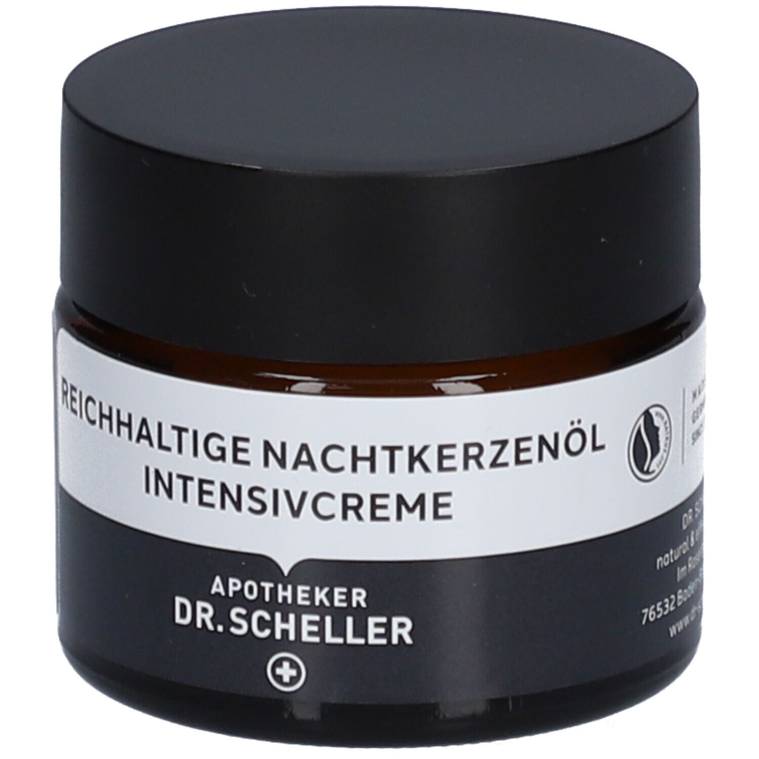 Braunes Creme-Glas mit schwarzem Deckel. Produktname auf weißem Etikett. Vegan-Siegel.