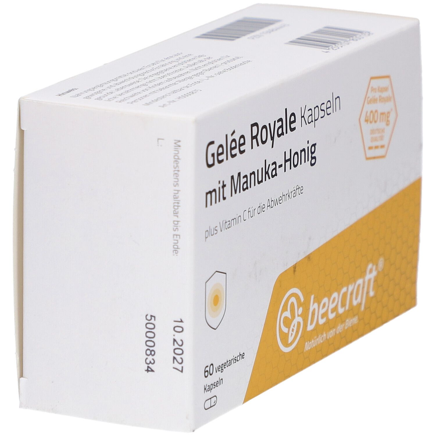 Weißer Karton mit 'Gelee Royale Kapseln mit Manuka-Honig'. Logo 'beecraft'. 60 vegetarische Kapseln. Haltbarkeit.