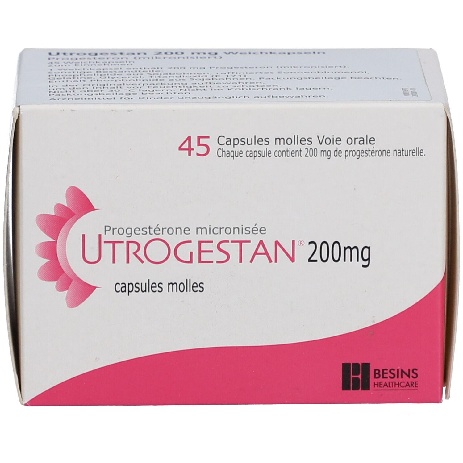 Schachtel mit UTROGESTAN 200 mg Weichkapseln. Aufschrift: 45 Kapseln. Rosa und weiße Verpackung. Logo: BESINS HEALTHCARE.