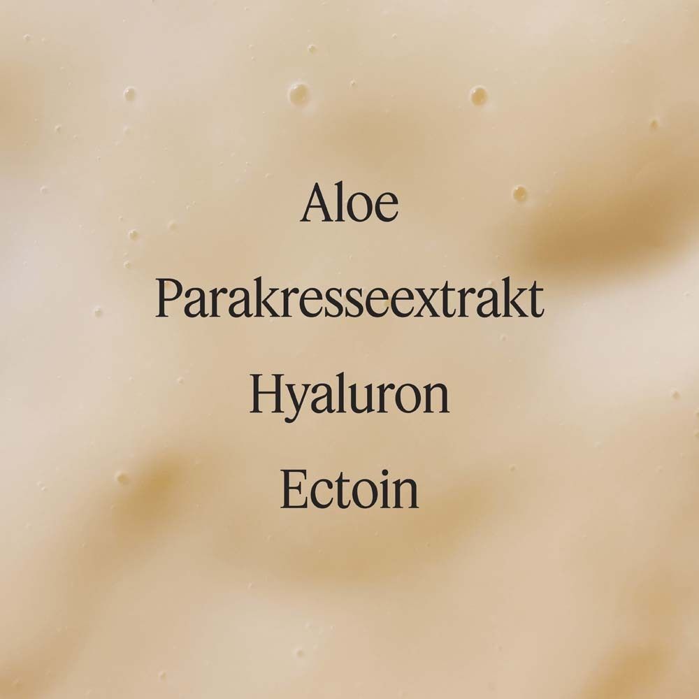 Text: Aloe, Parakresseextrakt, Hyaluron, Ectoin. Auf cremefarbenem Hintergrund.