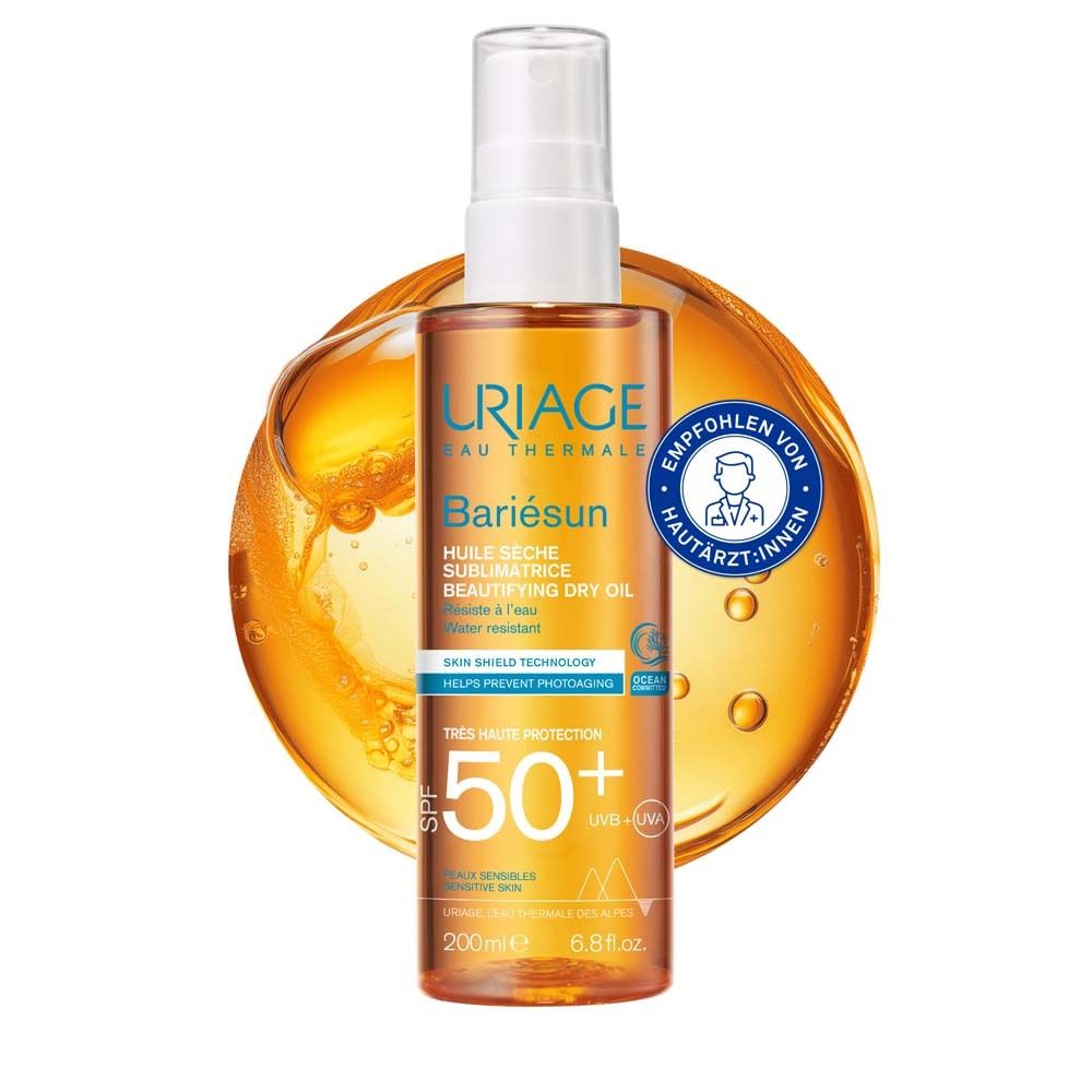 Uriage Bariésun SPF50+ Huile Sèche. Flacon orange avec vaporisateur blanc. Recommandé par les dermatologues.