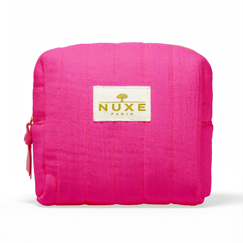 Pinkfarbene Kosmetiktasche mit goldfarbenem Reißverschluss und Logo "NUXE PARIS".