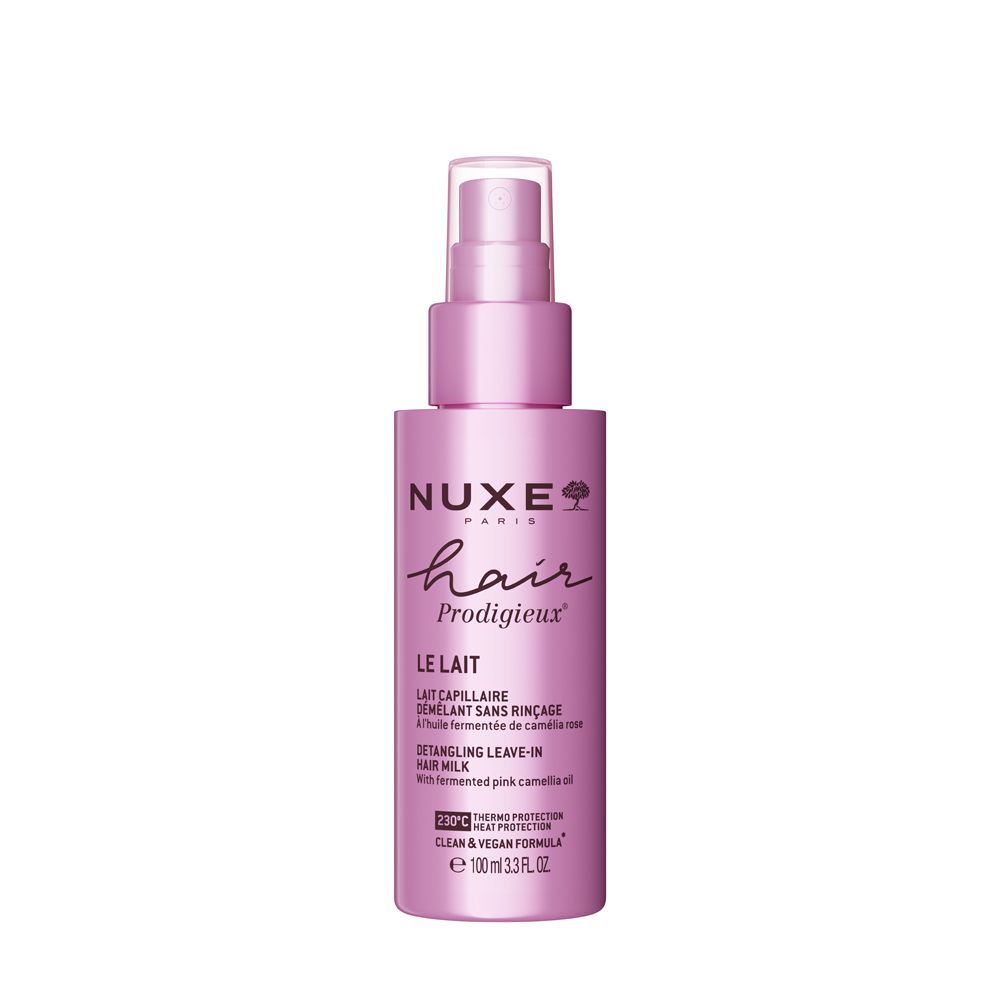 Rosa Flasche mit Zerstäuber. Aufschrift: NUXE Hair Prodigieux, Le Lait, Detangling Leave-in Hair Milk. 100ml.