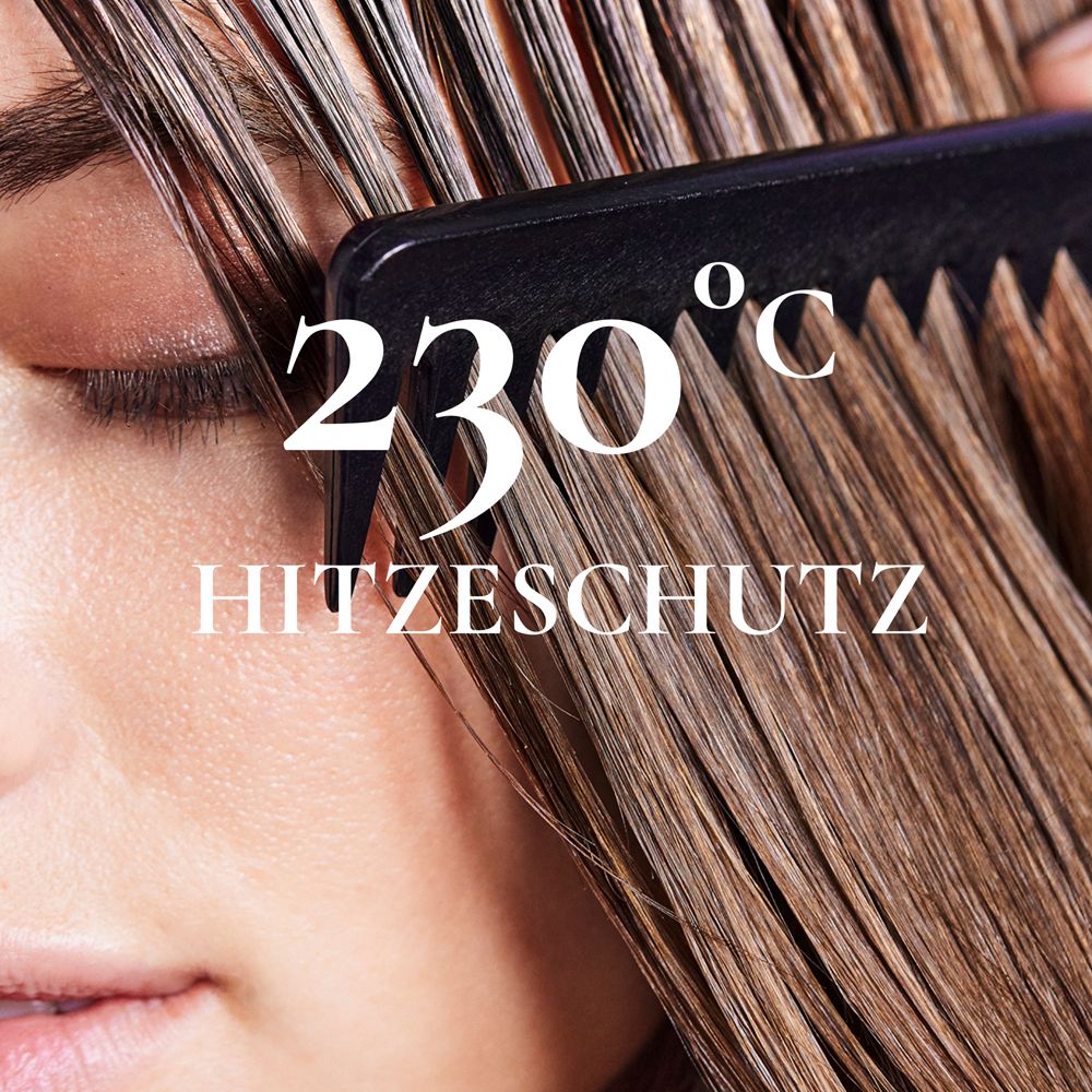 Haar wird mit einem Kamm gekämmt. Text: 230°C Hitzeschutz.