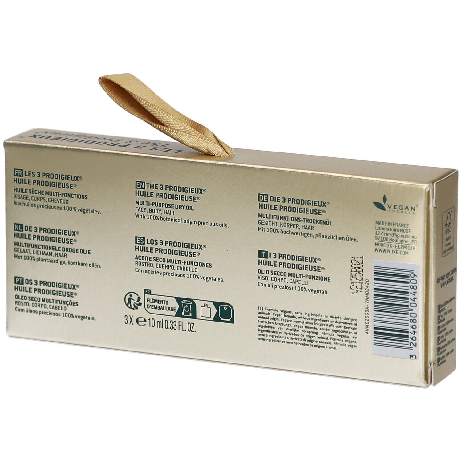 Rückseite der Geschenkbox. Text in mehreren Sprachen. Vegan-Logo. Barcode und Informationen zur Marke NUXE.