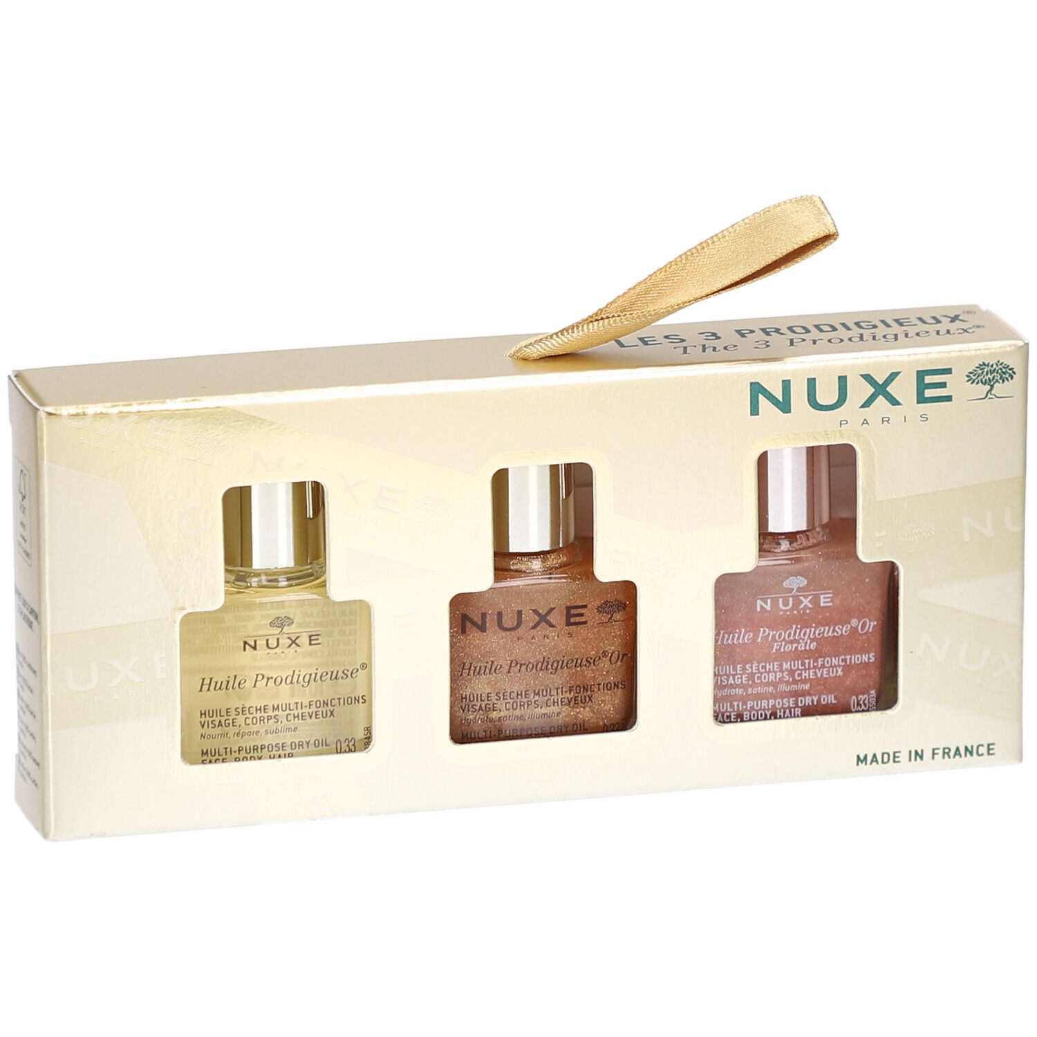 Geschenkset mit drei Ölen. Goldfarbene Verpackung mit Sichtfenstern. NUXE-Logo und Produktnamen sichtbar.