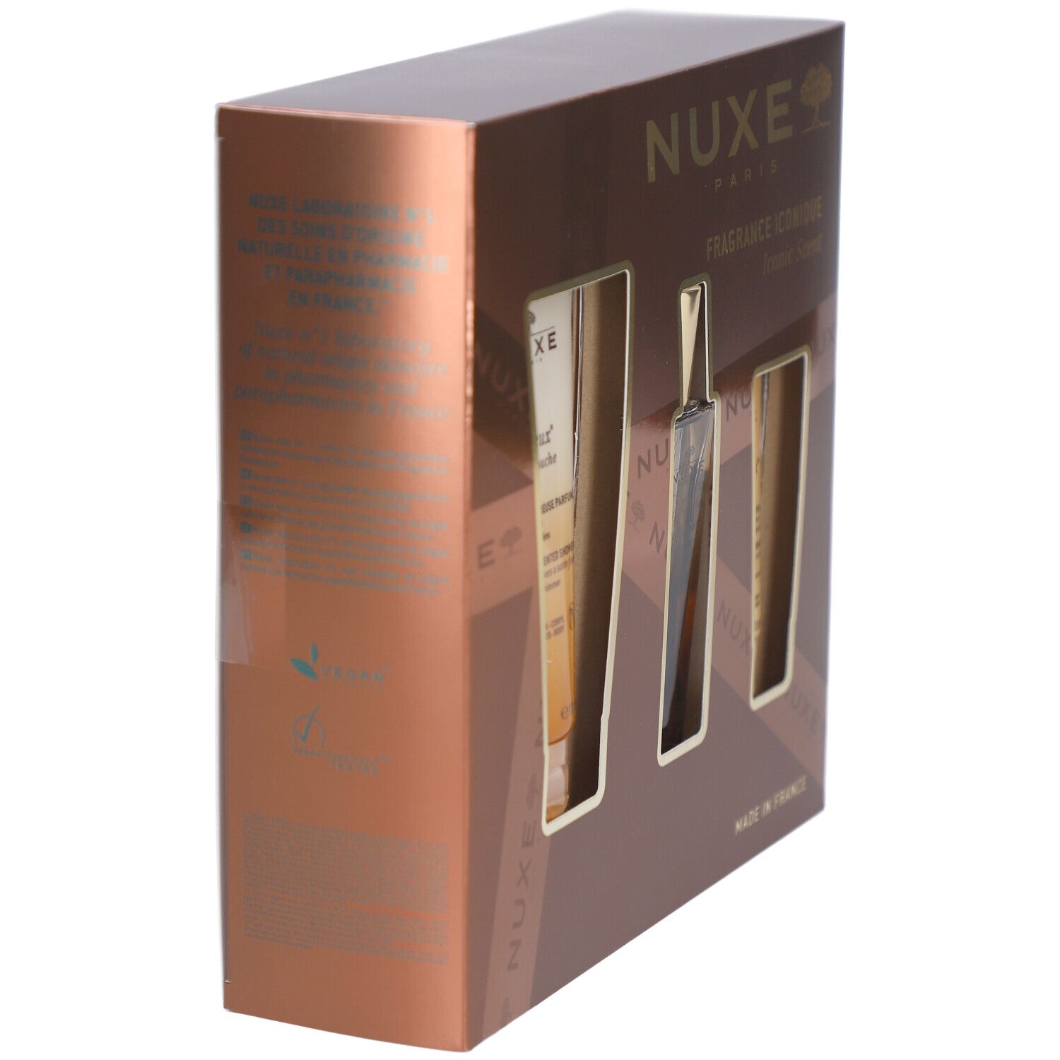 Braune Geschenkbox mit drei Aussparungen. Enthält Produkte von NUXE. Seitliche Ansicht. Text: NUXE PARIS, Fragrance Iconique.