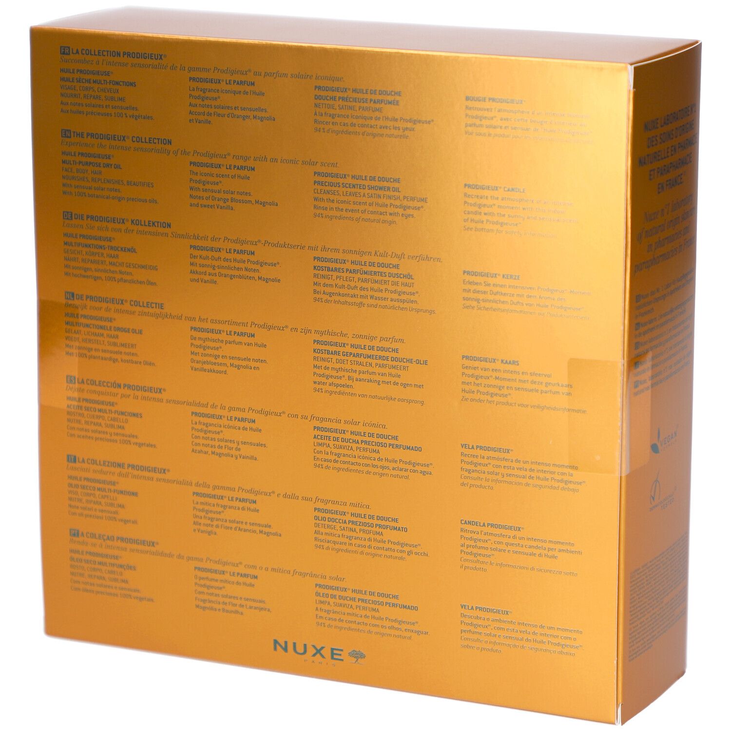 Rückseite einer goldenen Geschenkbox. Mehrere Textblöcke in verschiedenen Sprachen. NUXE-Logo unten rechts.