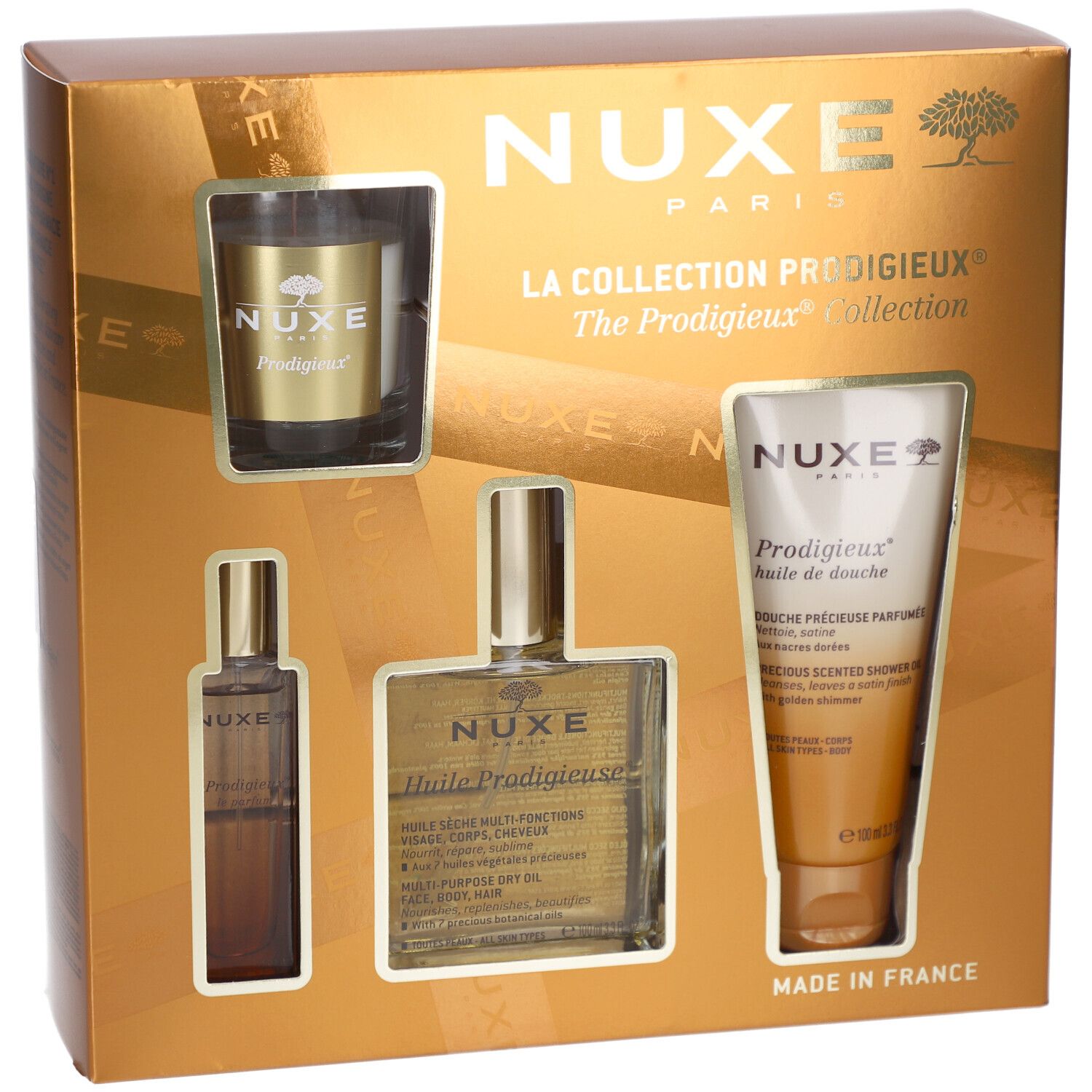 Geschenkset mit mehreren Produkten in goldener Verpackung. Enthält Flaschen, eine Tube und ein Glas. Text: La Collection Prodigieux®.