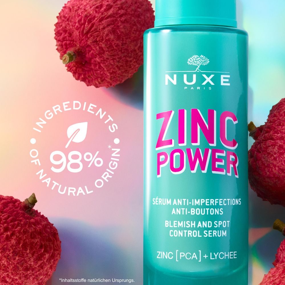 Flasche mit Serum und Lychees. Aufschrift: ZINC POWER. Text: Serum gegen Hautunreinheiten. NUXE-Logo. 98% natürlich.