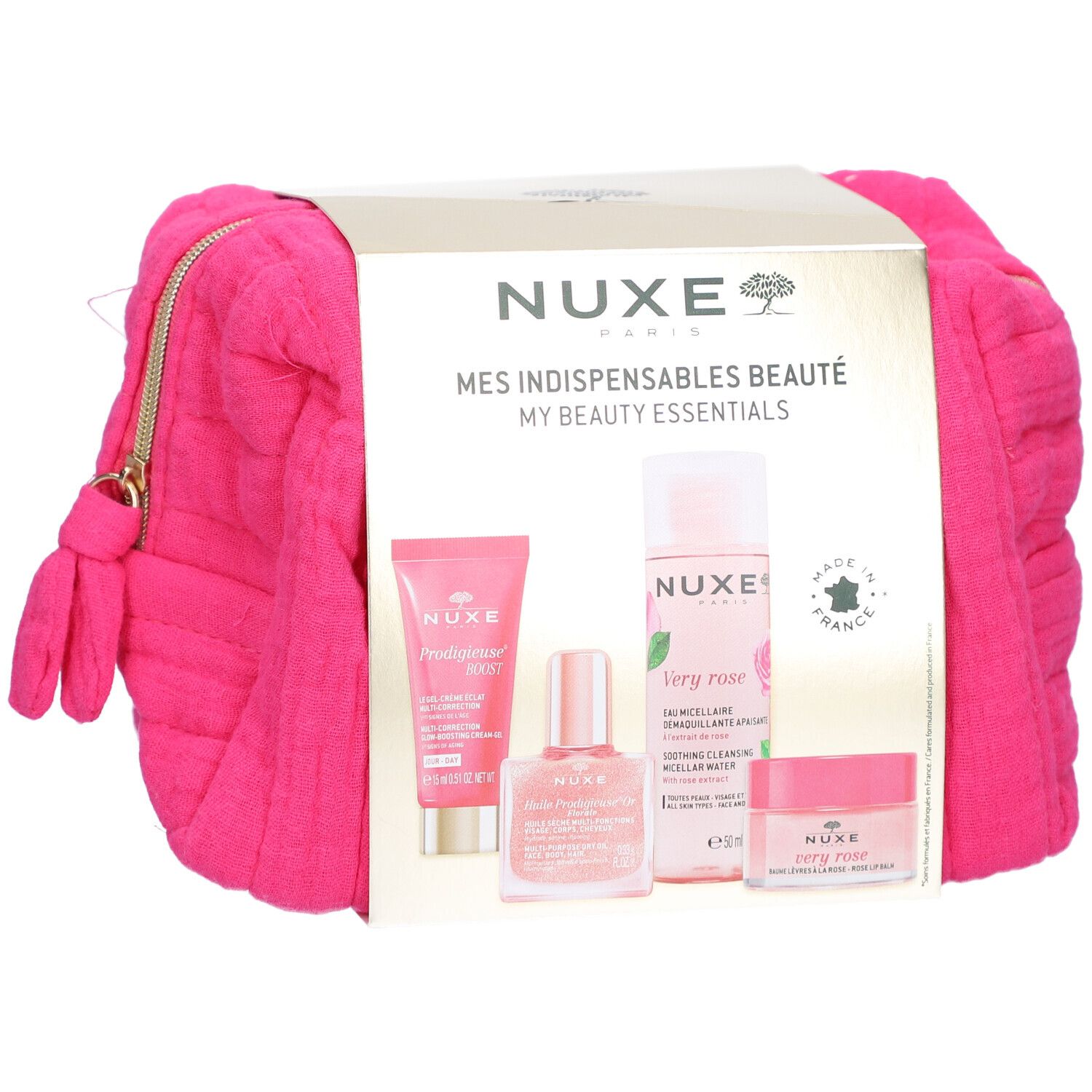 Pinkfarbene Kosmetiktasche mit NUXE-Produkten. Enthält vier Produkte und eine goldfarbene Verpackung.