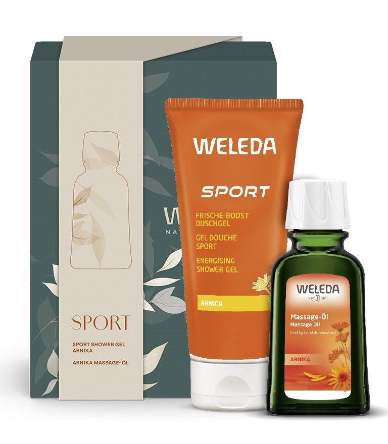 Geschenkset mit Duschgel und Massageöl. Orange Tube, grüne Flasche, grüne Verpackung. Aufdruck: WELEDA, SPORT.