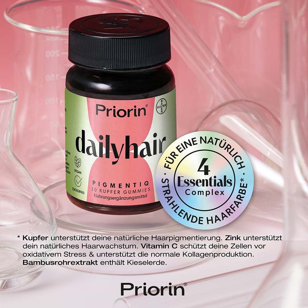 Flasche Priorin dailyhair mit 4 Essentials Complex. Text: Kupfer, Zink, Vitamin C, Bambus.