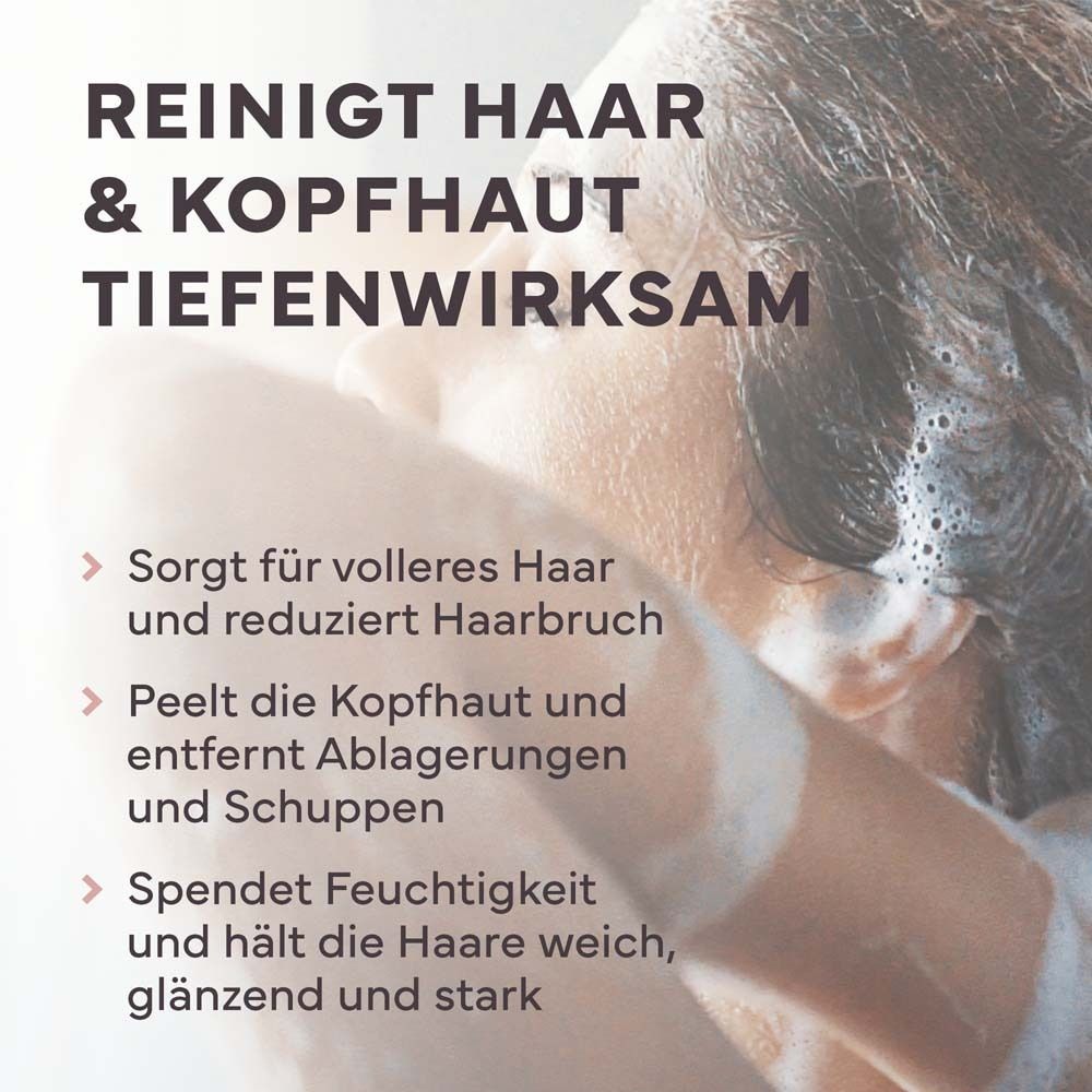 Text: Reinigt Haar & Kopfhaut tiefenwirksam. Sorgt für volleres Haar, peelt die Kopfhaut, spendet Feuchtigkeit.