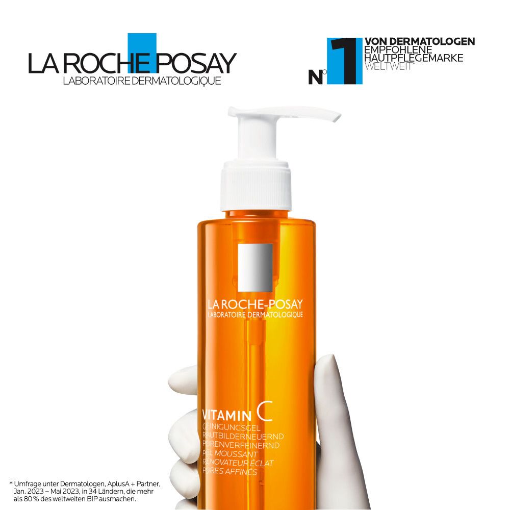 Orangefarbene Flasche mit Pumpe. La Roche-Posay Logo. Text: Vitamin C. Von Dermatologen empfohlen.