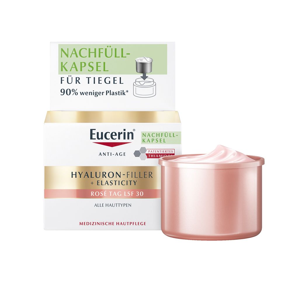 Eucerin® Hyaluron-Filler + Elasticity Rosé Tag LSF 30 Nachfüllkapsel. Rosa Creme im Tiegel. Verpackung mit Text.