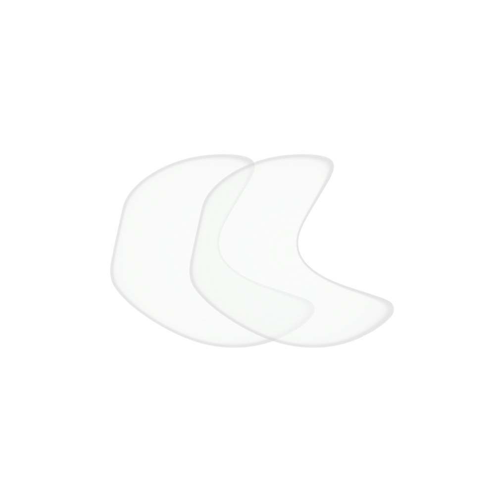 Zwei transparente, halbmondförmige Augen-Schläfen Pads. Sie sind leicht gebogen und haben eine glatte Oberfläche.