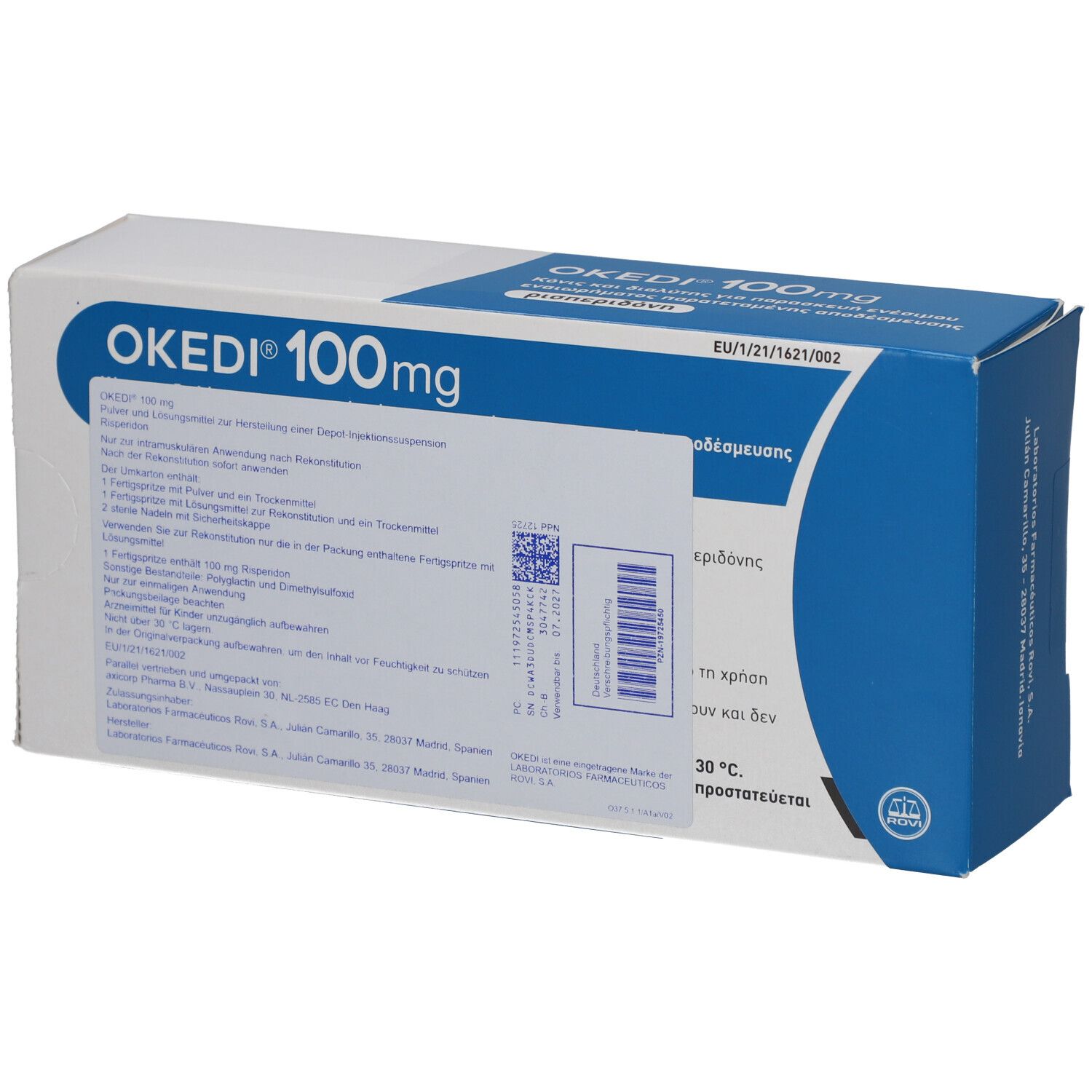 Blau-weiße Schachtel mit OKEDI 100mg. Griechischer Text. Enthält Injektionszubehör. Rückseite mit Text und QR-Code.