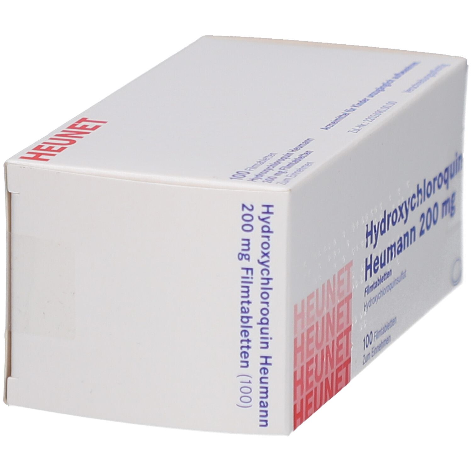 Weiße Faltschachtel mit Aufschrift HYDROXYCHLOROQUIN Heumann 200 mg Filmtabl. Heunet. Rote und blaue Schrift. Schachtel schräg.