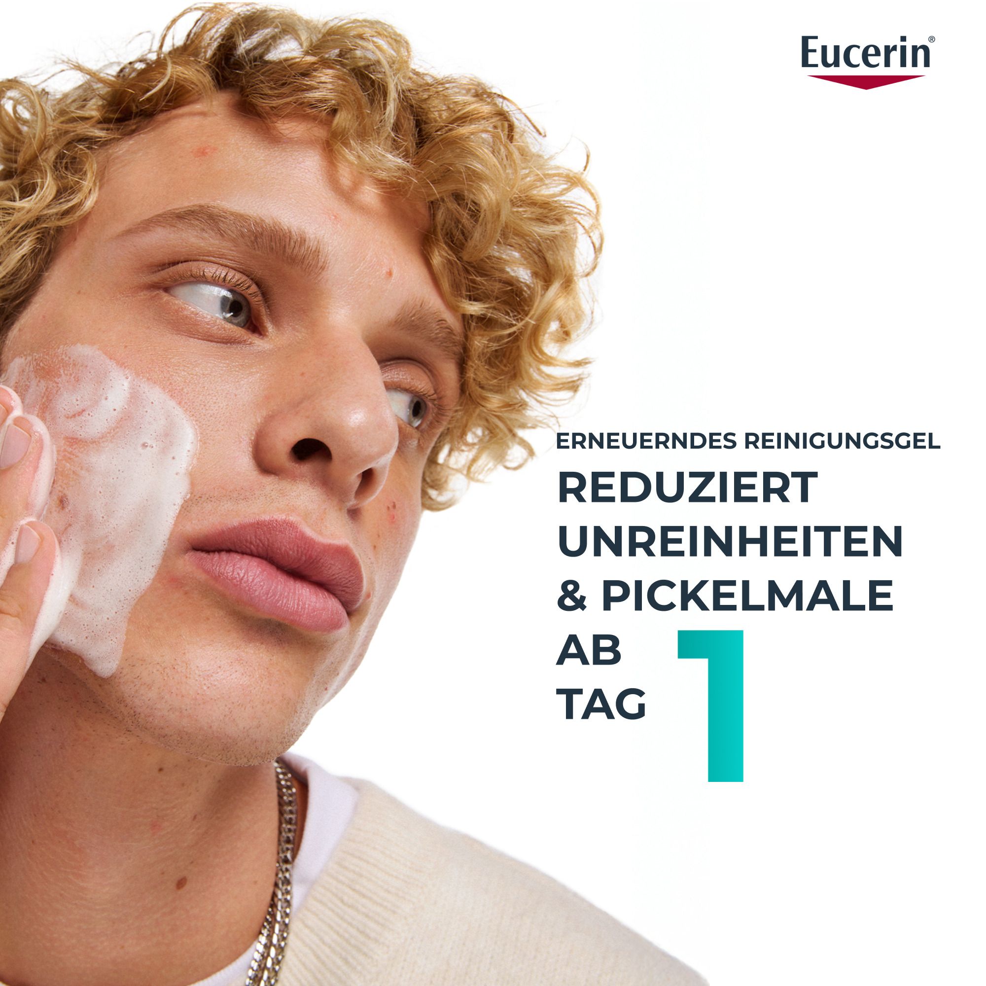 Mann wäscht Gesicht mit Schaum. Text: Erneuerndes Reinigungsgel reduziert Unreinheiten & Pickelmale ab Tag 1.