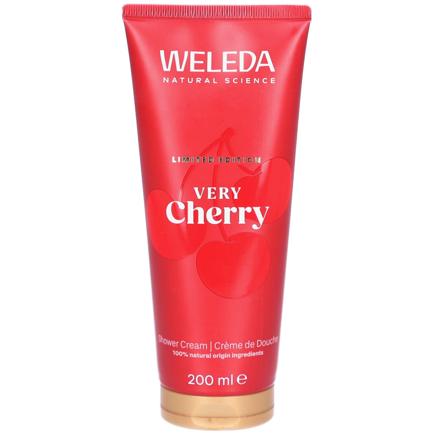 Rote Tube mit Schriftzug WELEDA, Very Cherry und Kirsch-Illustration. Limited Edition. Goldener Verschluss.