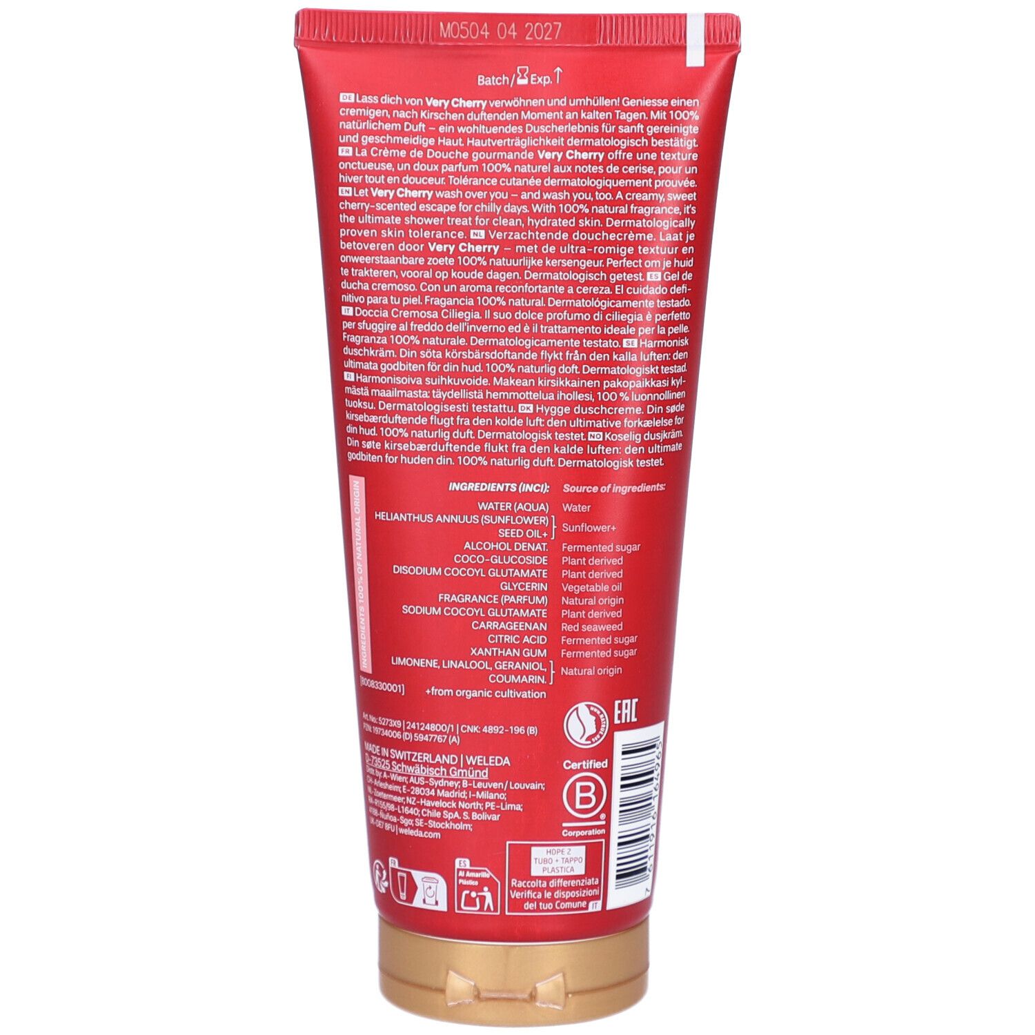 Rückseite der roten Tube. Text in mehreren Sprachen. Inhaltsstoffe und Zertifizierungen. Goldener Verschluss.