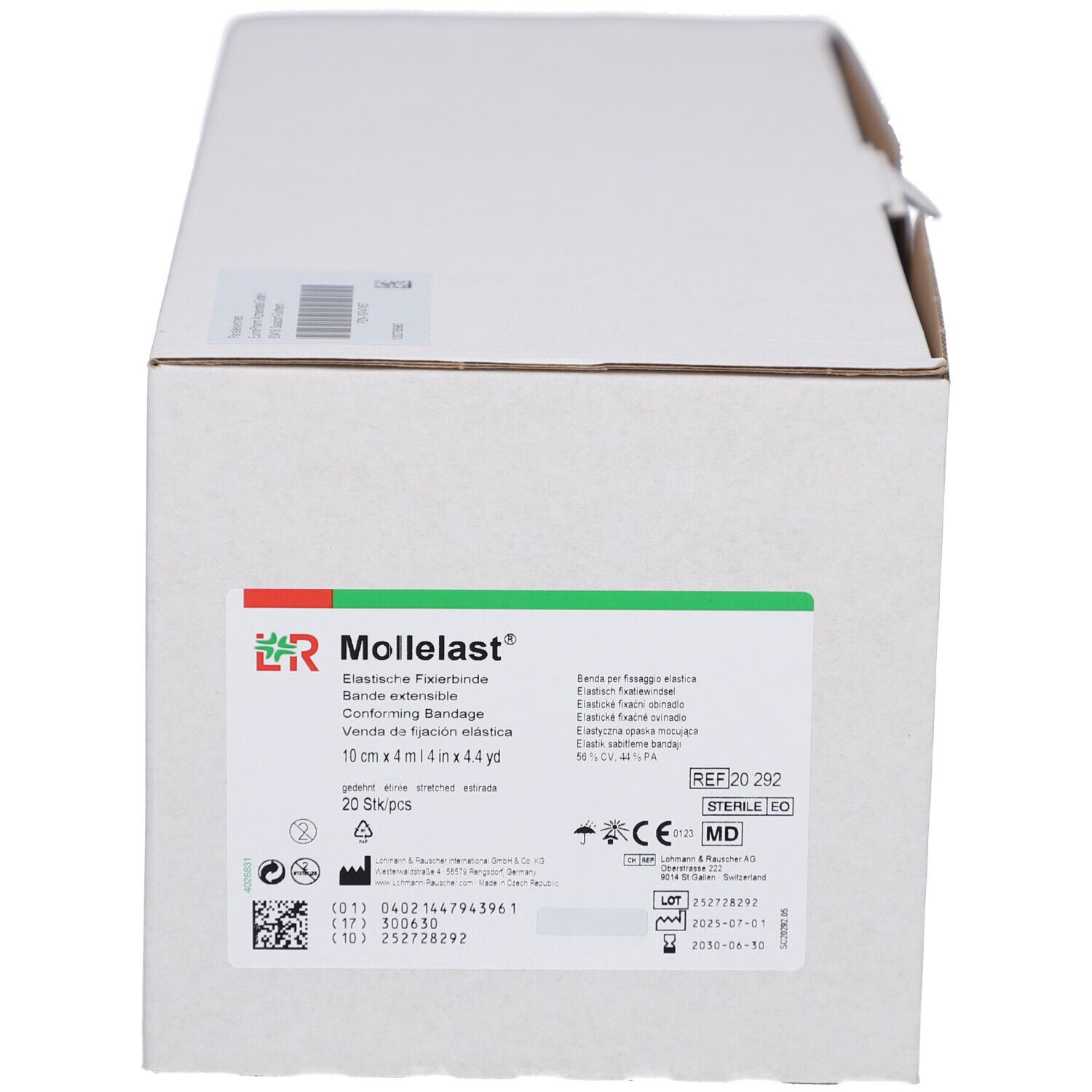 Karton mit Mollelast® Fixierbinden. Grün-weiße Verpackung mit Produktnamen, Größenangabe und Logo. 20 Stück.