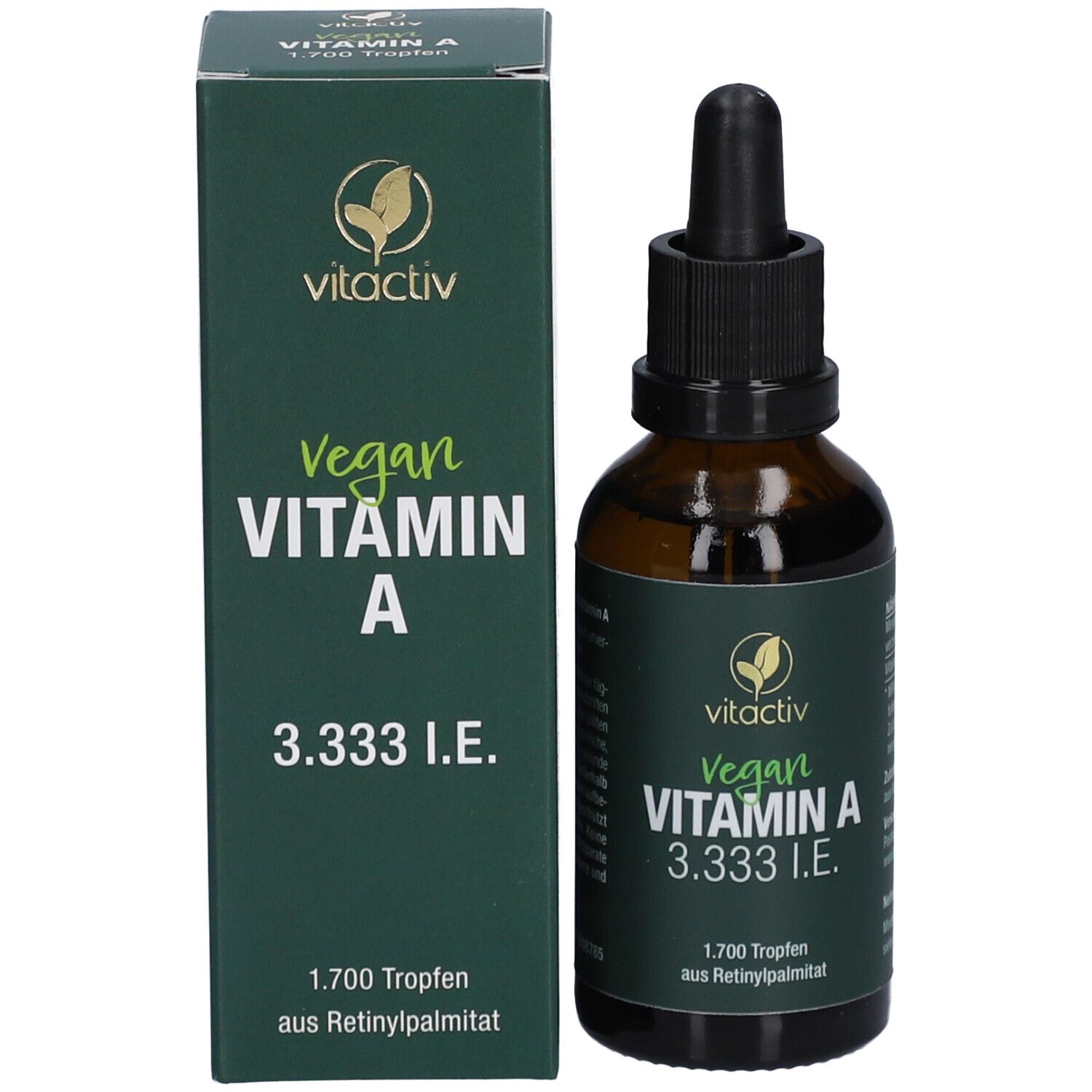 Braune Glasflasche mit schwarzem Deckel und Pipette neben einer grünen Schachtel. Aufschrift: Vegan VITAMIN A 3.333 I.E.