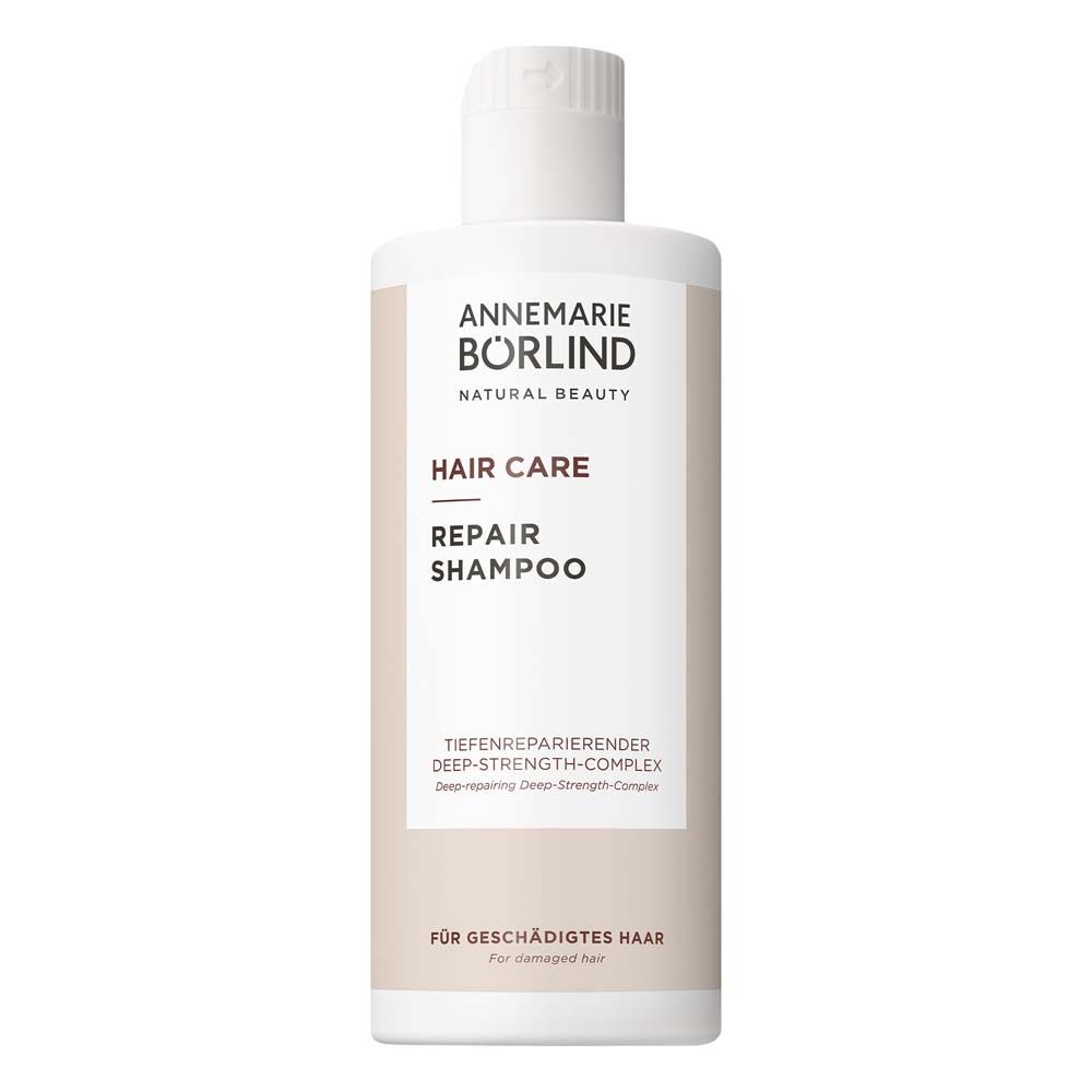 Weiße Flasche mit ANNEMARIE BÖRLIND Hair Care Repair Shampoo. Text: Hair Care, Repair Shampoo. Für geschädigtes Haar.