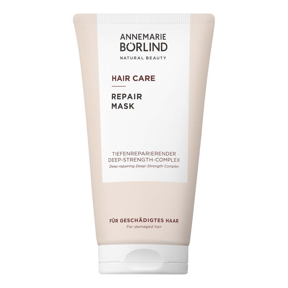 Beige Tube mit weißem Deckel. Aufschrift: ANNEMARIE BÖRLIND, Hair Care, Repair Mask. Für geschädigtes Haar.