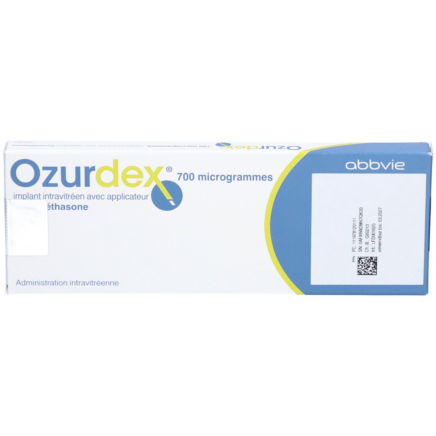 Ozurdex-Verpackung, 700 Mikrogramm, mit Applikator. Weiße und blaue Schachtel mit Produktnamen und Logo.
