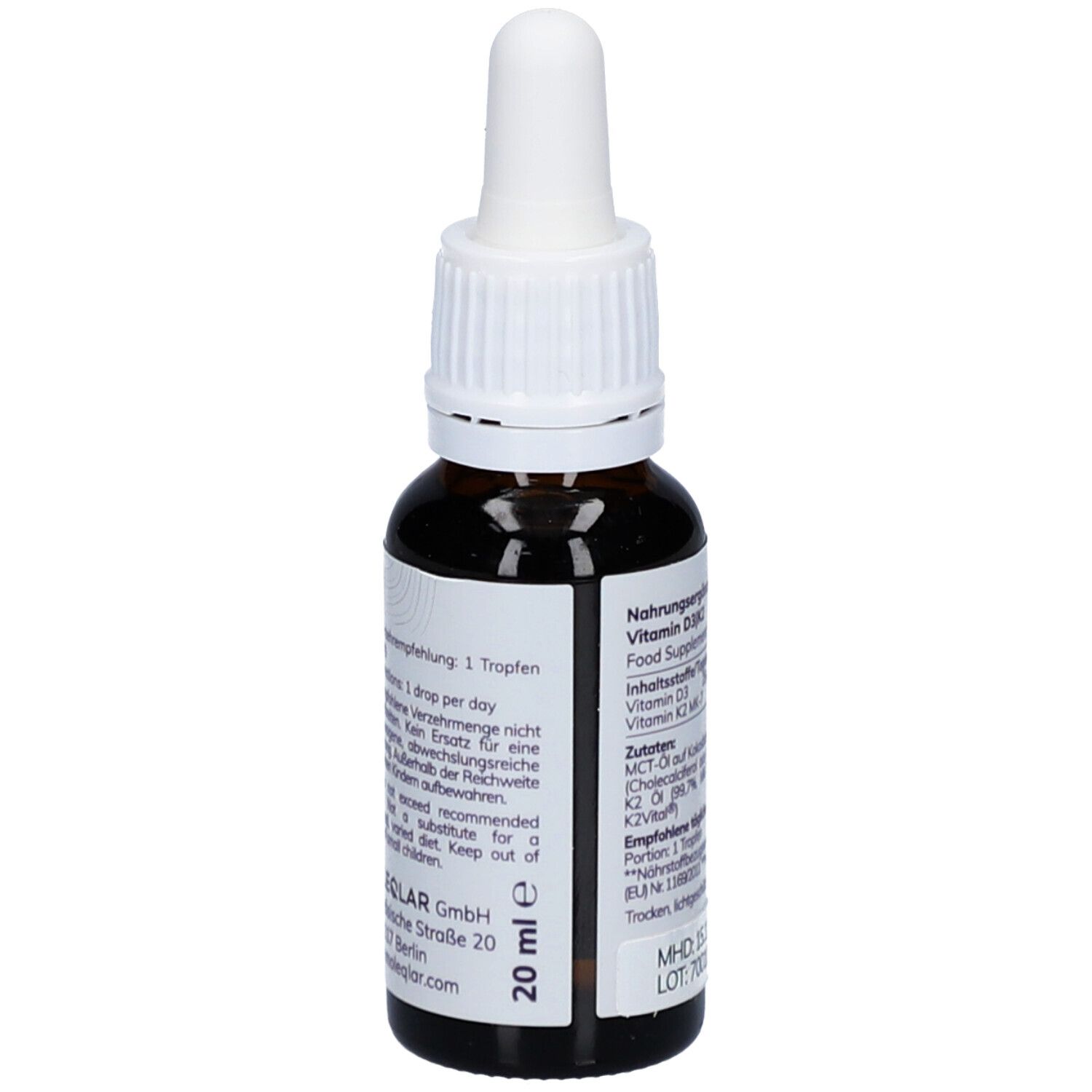 Rückseite einer braunen Glasflasche mit weißem Deckel. Aufschrift: Nahrungsergänzungsmittel. Inhaltsstoffe: Vitamin D3, K2. 20 ml.