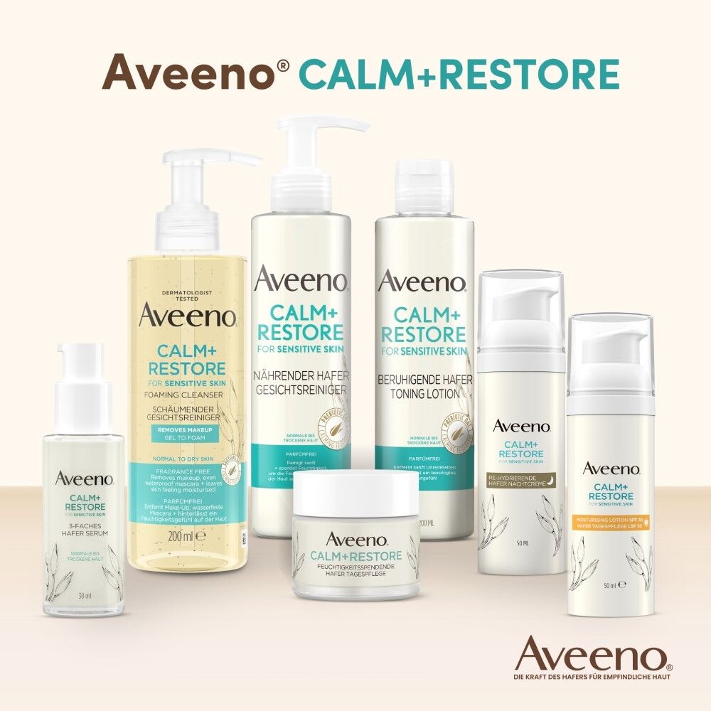 Verschiedene Aveeno Calm+Restore Produkte. Flaschen, Tiegel, Tuben. Aveeno Logo.
