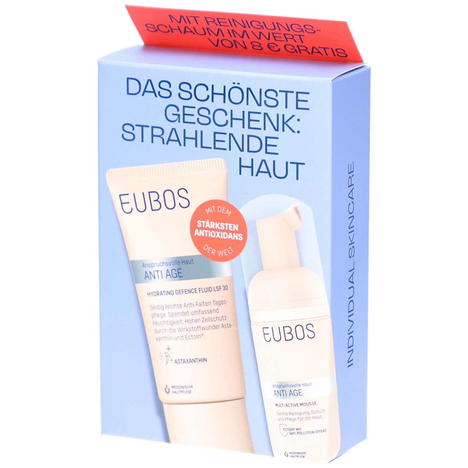 Geschenkset mit zwei Produkten. Blaue Verpackung mit Text und Logo. Enthält eine Tube und eine Flasche. Roter Aufkleber oben.