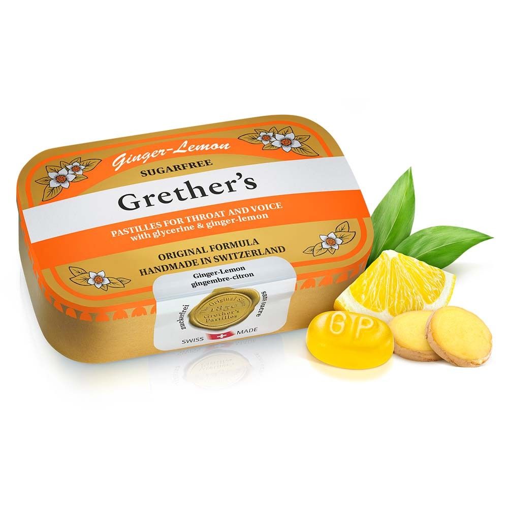 Goldfarbene Schachtel mit Pastillen, Zitrone und Blättern. Aufschrift: Grether's, Ginger-Lemon, zuckerfrei. Schweizer Qualitätssiegel.