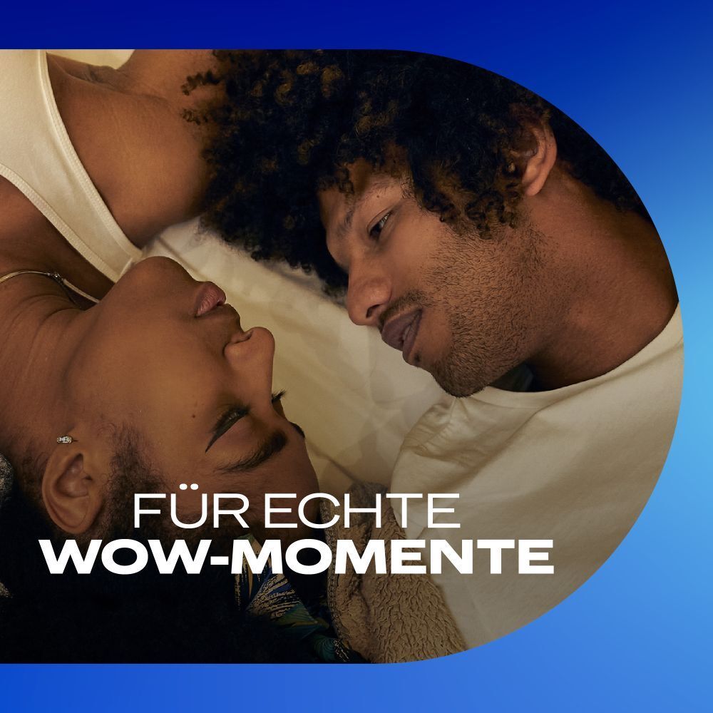 Paar im Bett. Text: Für echte Wow-Momente.