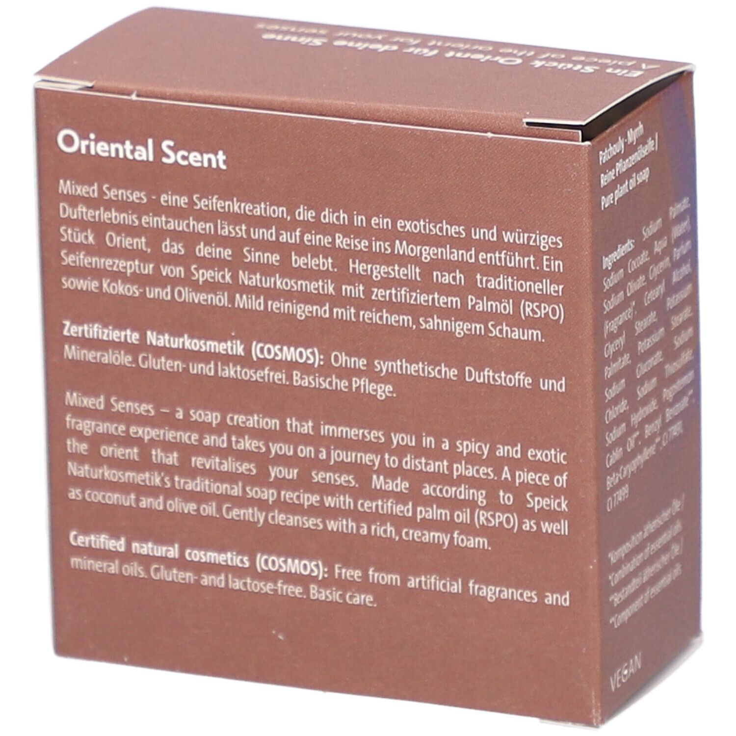 Karton mit Text über "Oriental Scent" und Inhaltsstoffe. Vegan-Logo und Cosmos Natural-Zertifizierung.