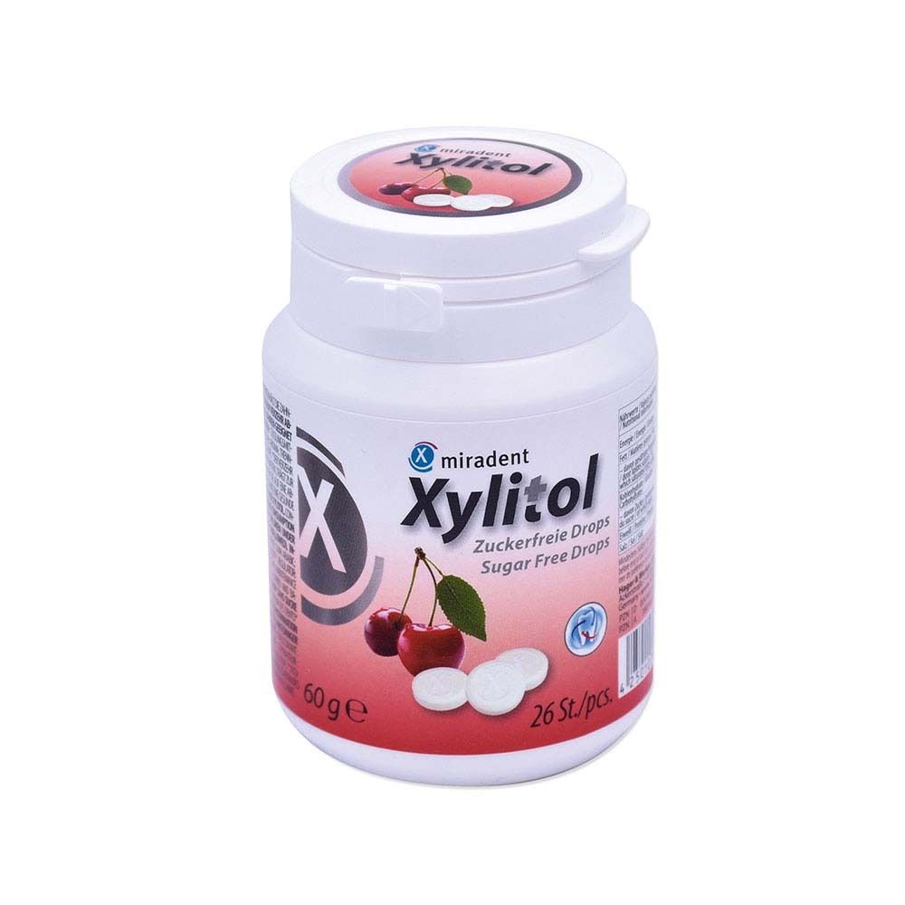 Weiße Dose mit Kirsch-Motiv und "miradent Xylitol"-Aufdruck. Enthält zuckerfreie Drops. 60g, 26 Stück.