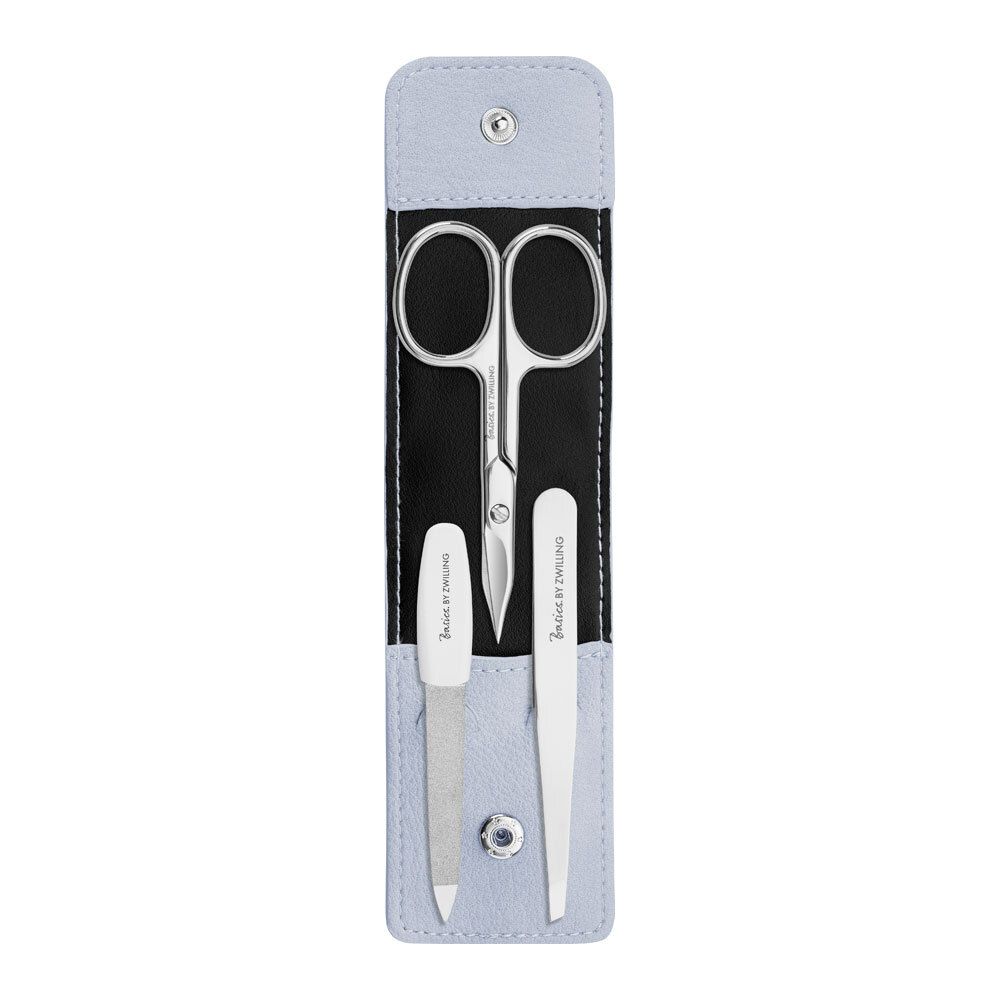 Nagelpflege-Set mit Etui. Enthält Schere, Feile und Pinzette. Marke Basics by Zwilling. Hellblaues Etui.