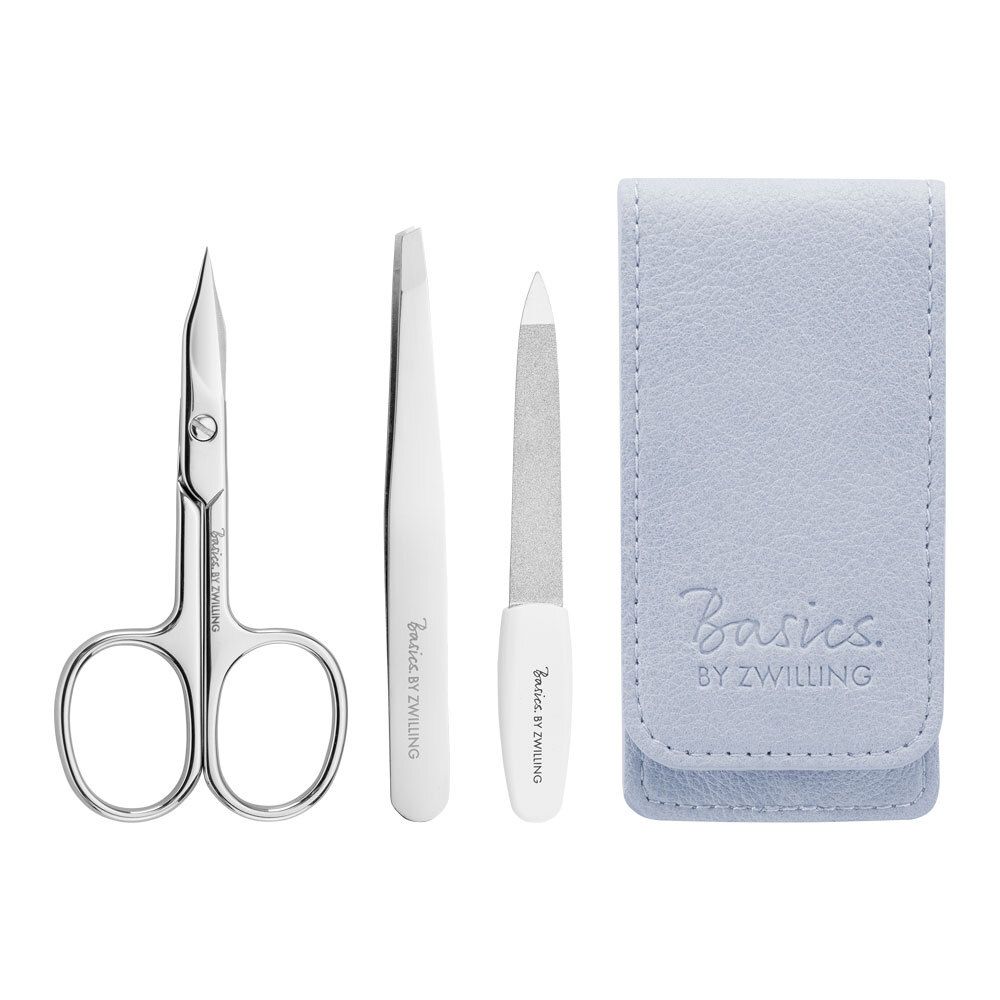 Nagelpflege-Set mit Etui. Enthält Schere, Pinzette und Feile. Marke Basics by Zwilling. Hellblaues Etui.