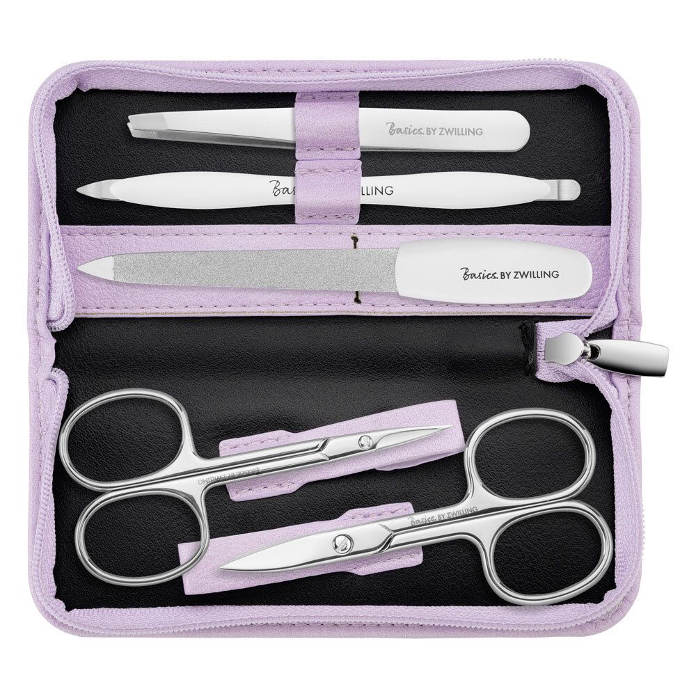 Nagelpflege-Set in lila Etui. Enthält Schere, Pinzette, Nagelfeile und weitere Werkzeuge.