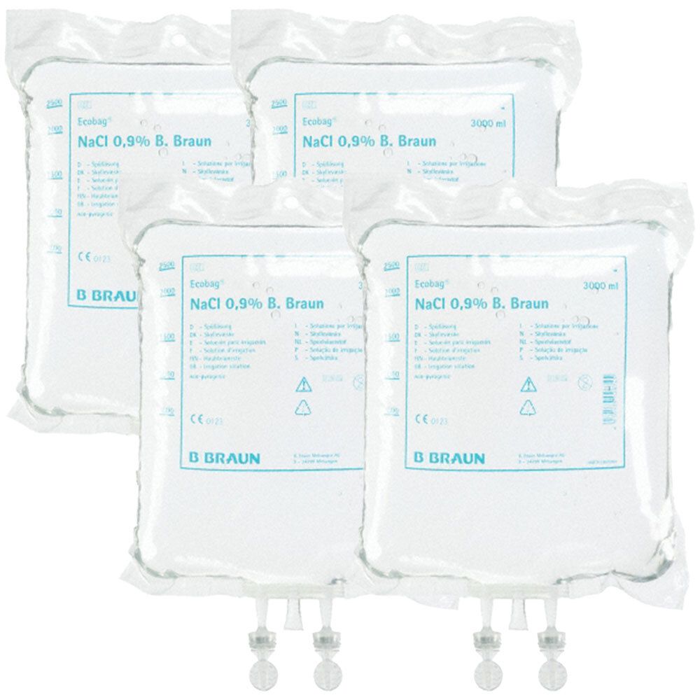 Mehrere Beutel mit Kochsalzlösung. Aufschrift: NaCl 0,9% B. Braun. Klare Flüssigkeit in flexiblen Beuteln mit Anschlüssen.