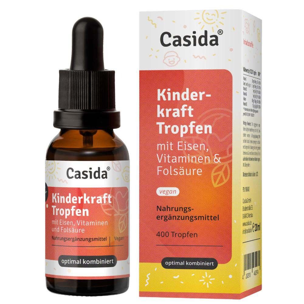 Braune Glasflasche mit Tropfer und Verpackung. Aufschrift: Casida Kinderkraft Tropfen mit Eisen, Vitaminen & Folsäure.