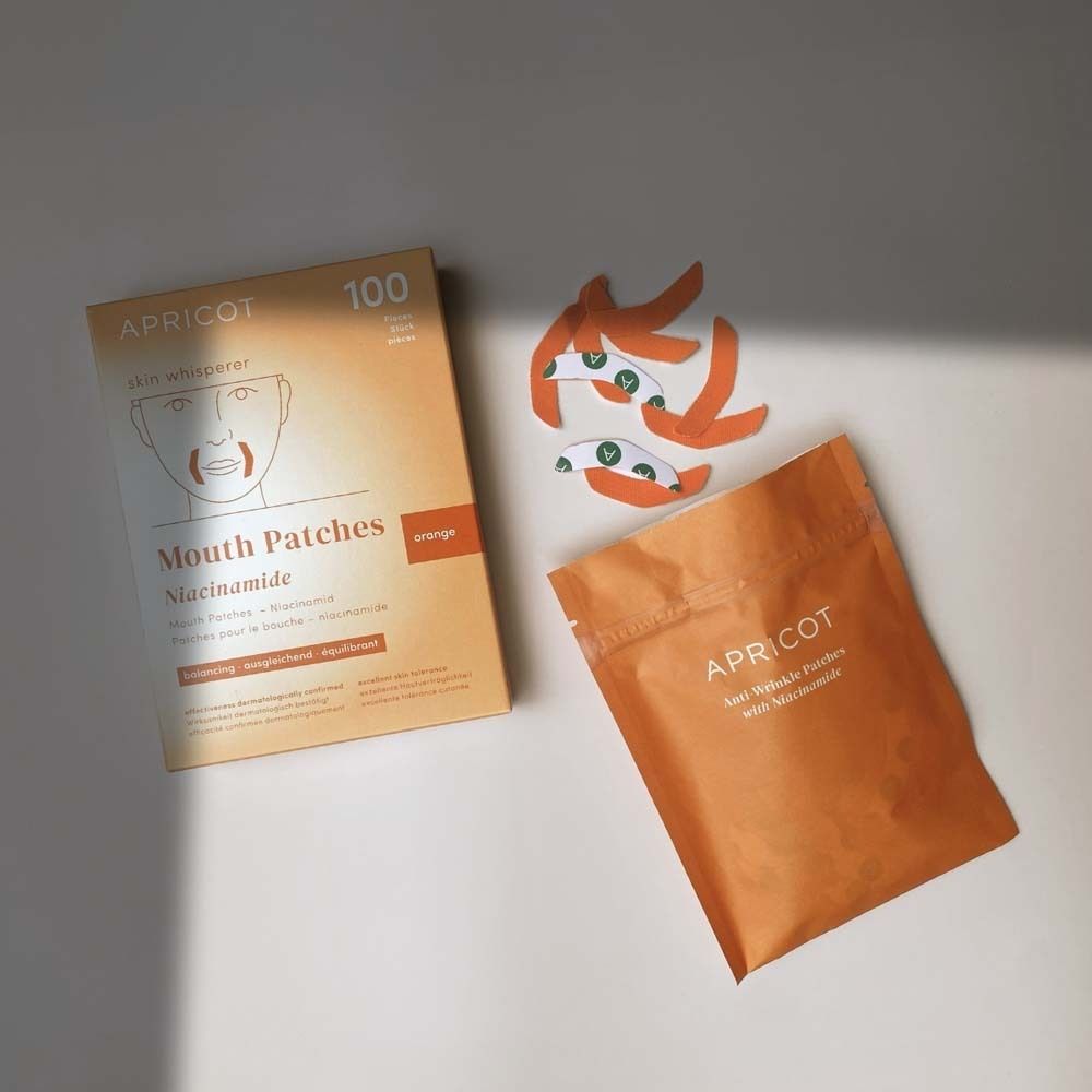Verpackung, Beutel und Patches. Aufdruck: APRICOT, skin whisperer, Mouth Patches Niacinamide.