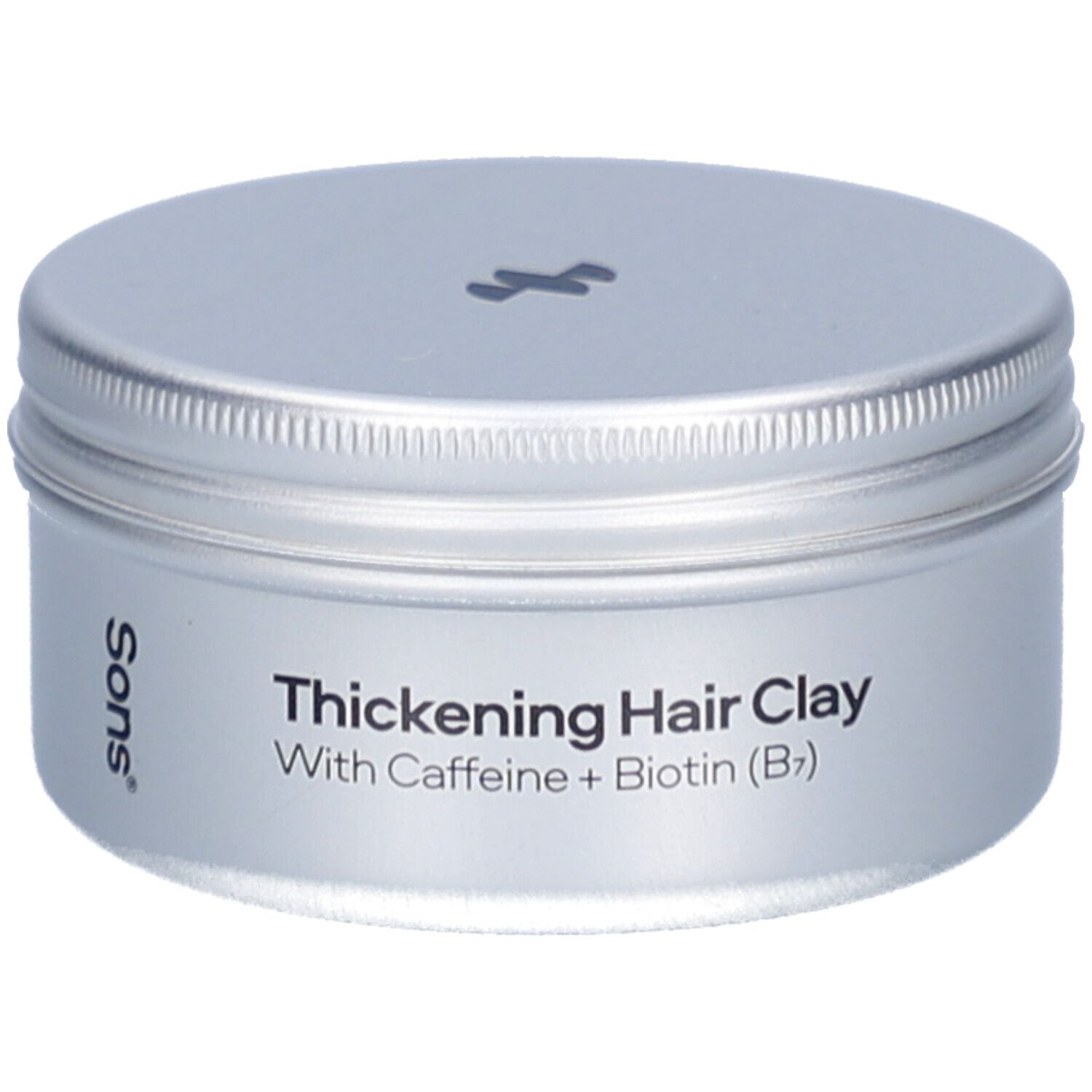Silberfarbene Dose mit Deckel. Aufschrift: Thickening Hair Clay, With Caffeine + Biotin (B7). Marke: Sons.