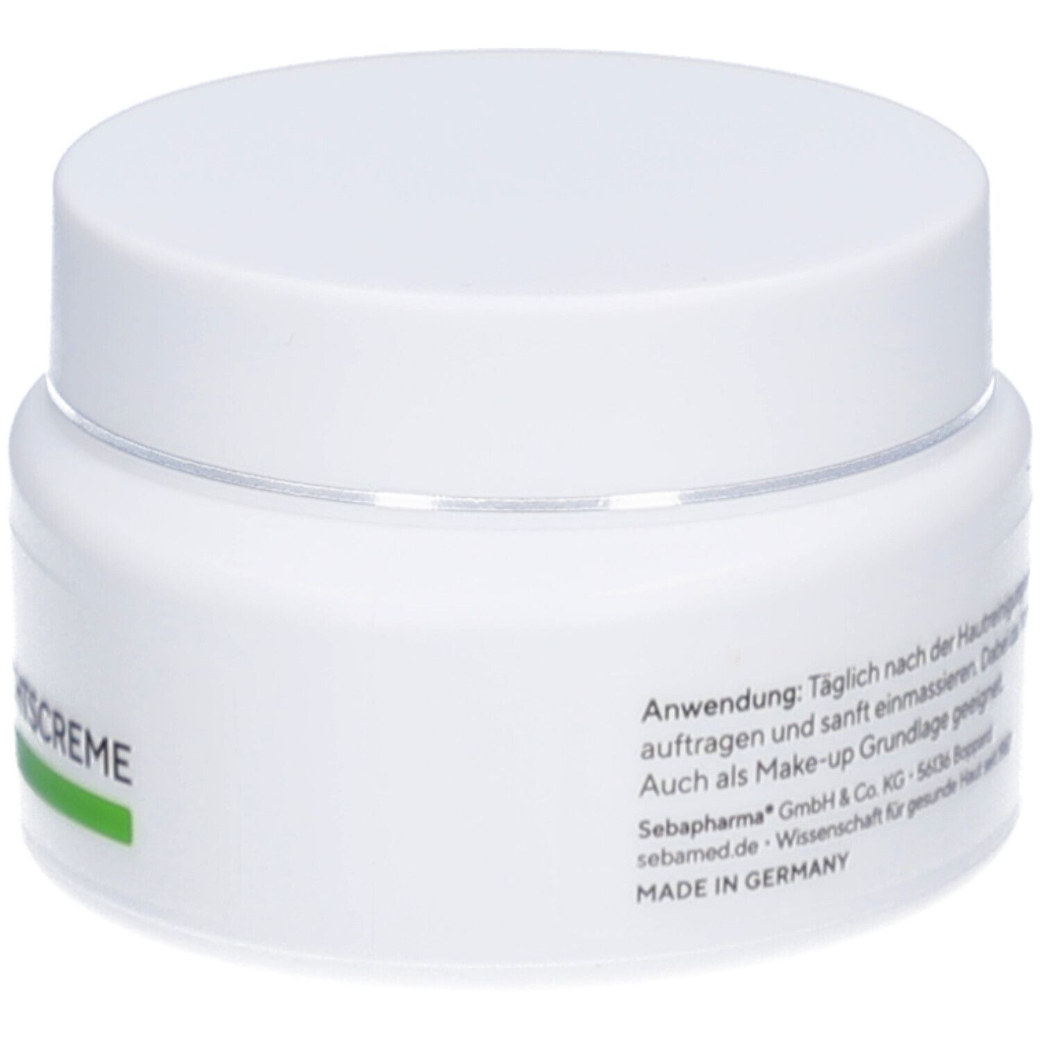 Weiße Creme-Dose mit Deckel. Aufschrift: sebamed. Text. Made in Germany. Grün-weiße Beschriftung.