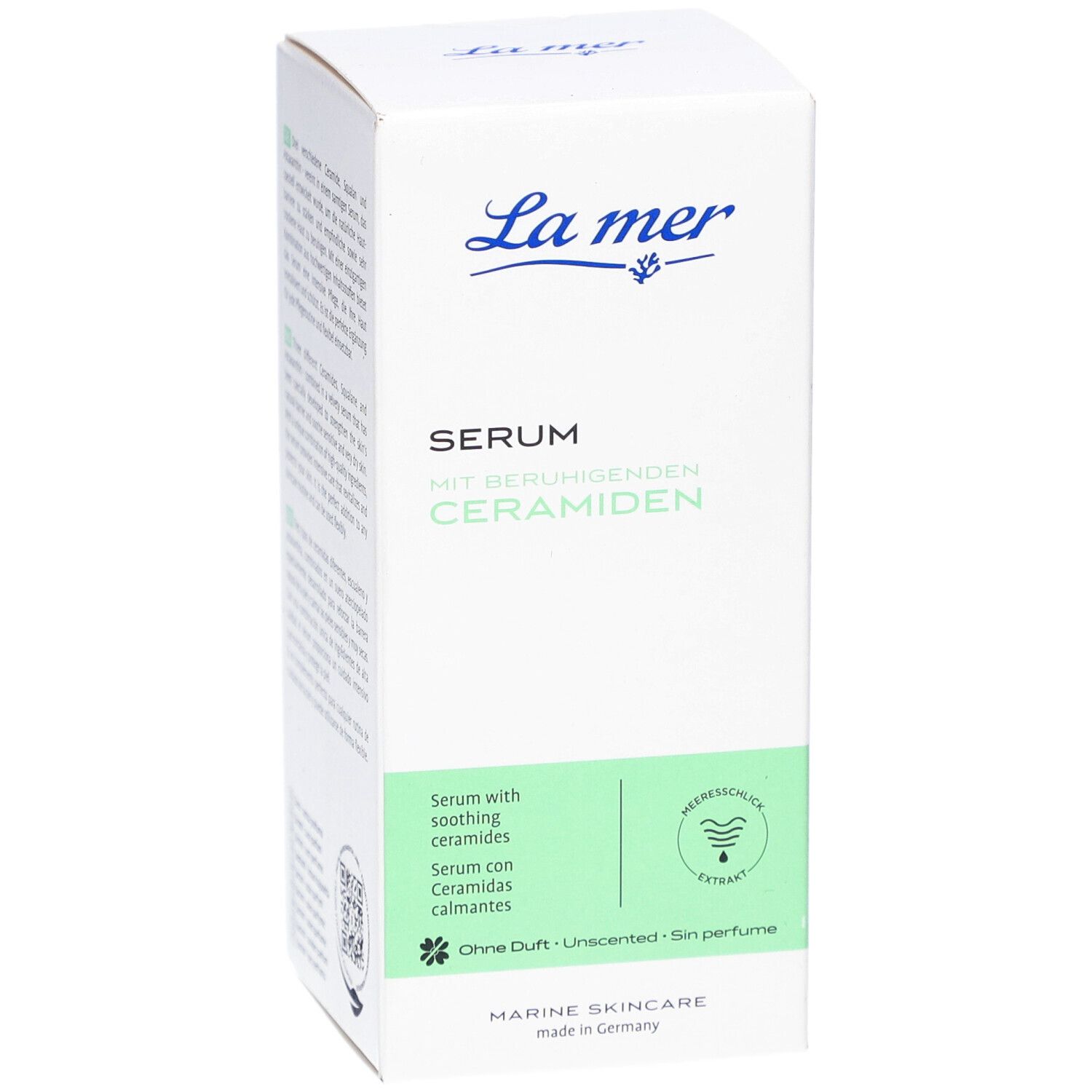 Weiße Schachtel mit "La mer"-Logo und Produktbezeichnung "Serum mit beruhigenden Ceramiden". Grün hinterlegter Bereich mit Text.