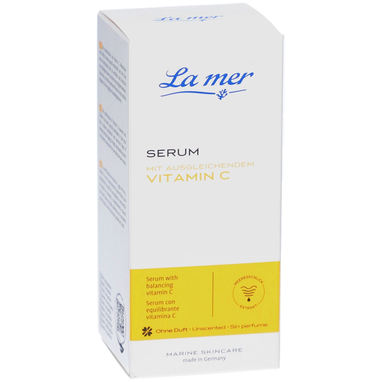 Weiße Verpackung mit La mer-Logo und Produktbezeichnung: Serum mit ausgleichendem Vitamin C. Gelber Akzent.